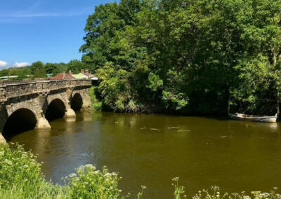 A River boat rests in the shade on one of our guided walks